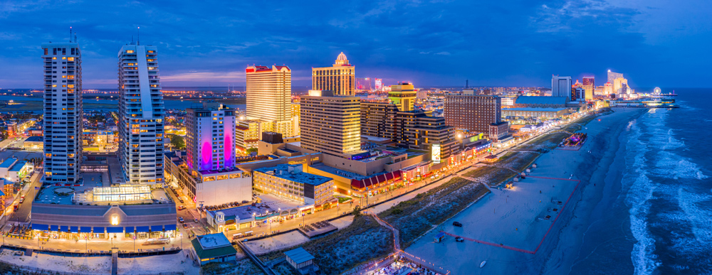 Aerial-panorama-of-Atlantic-city-along-the-boardwalk-at-dusk