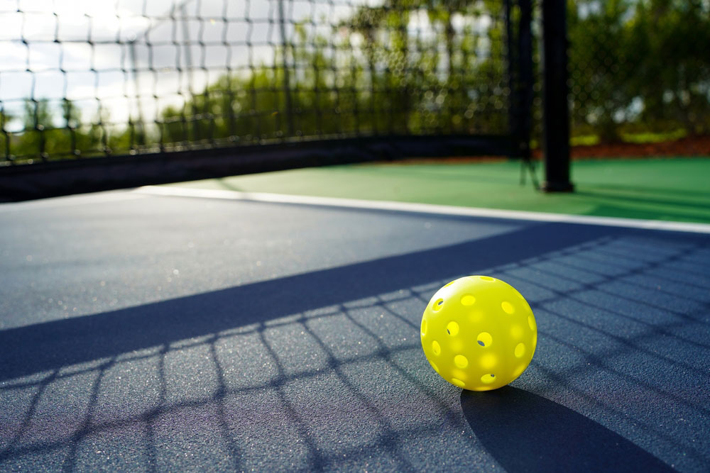 Close-up-of-a-pickleball-on-a-pickleball-court