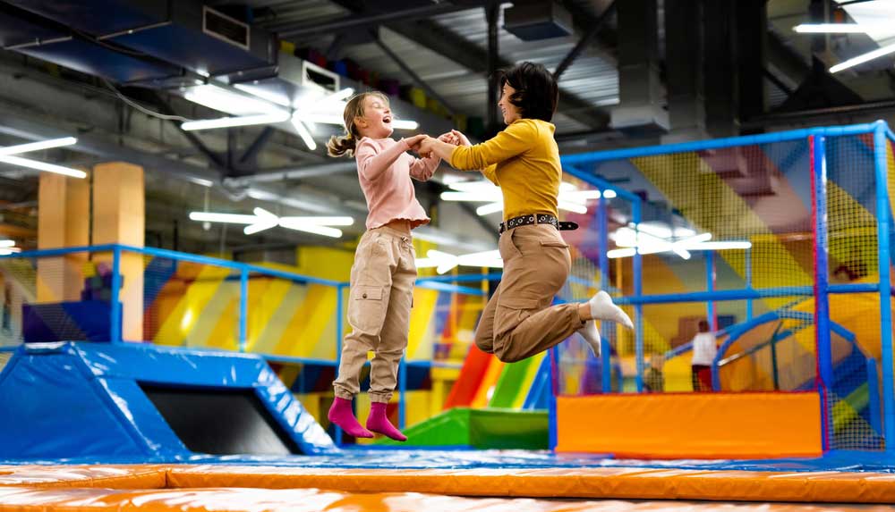 parent-and-child-on-trampoline-park