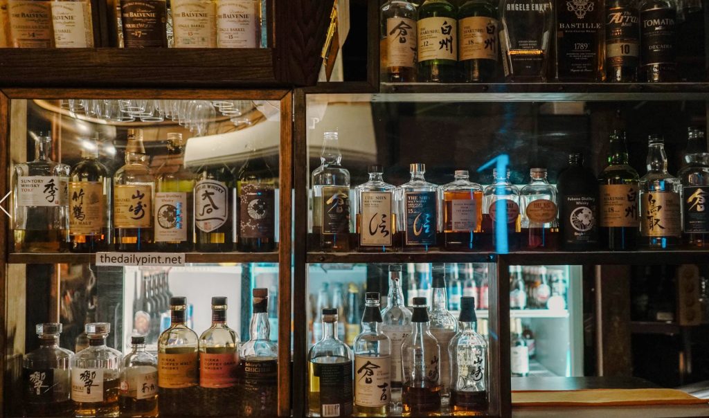 whiskey-bottles-on-shelves